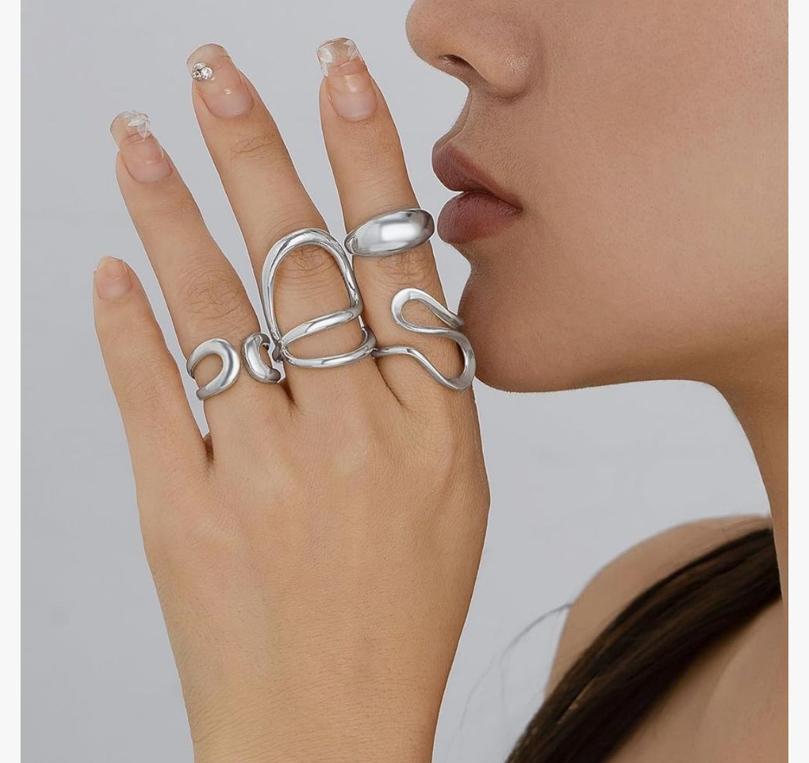 Cuatro anillos plateados