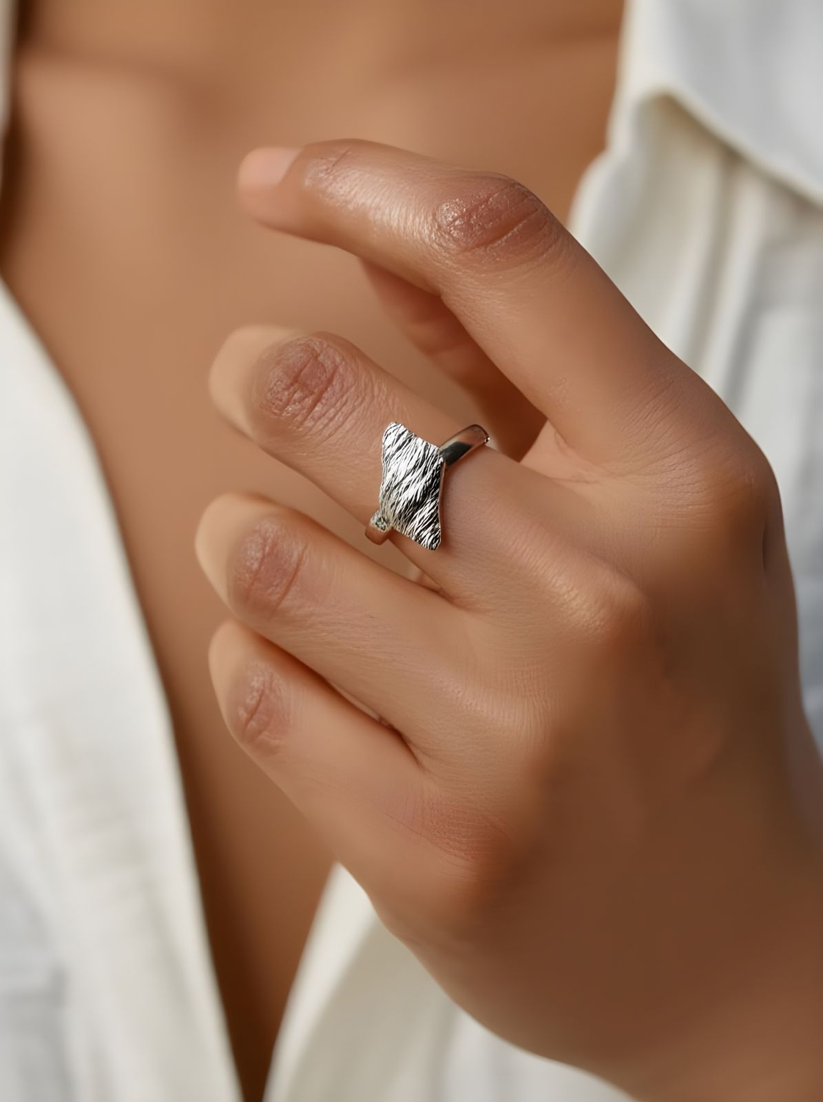 Anillo caracol plateado