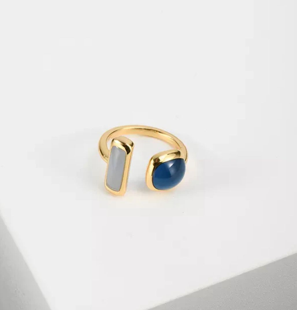 Anillo gris y azul autoajustable