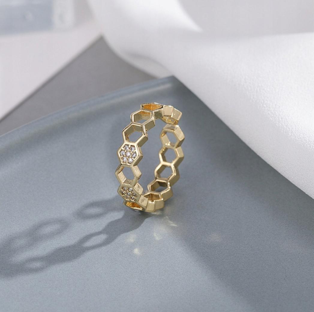 Anillo panal con circonia autoajustable