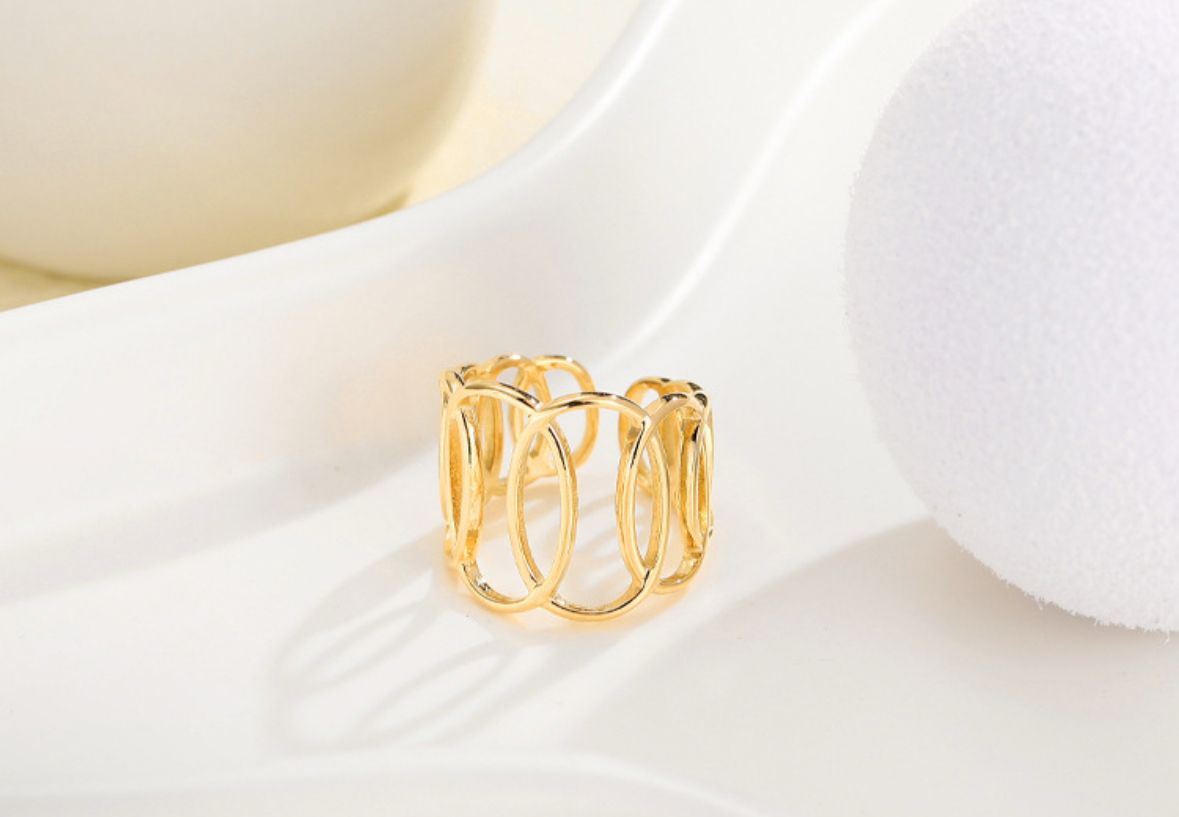 Anillo círculos ajustable chapa oro 18