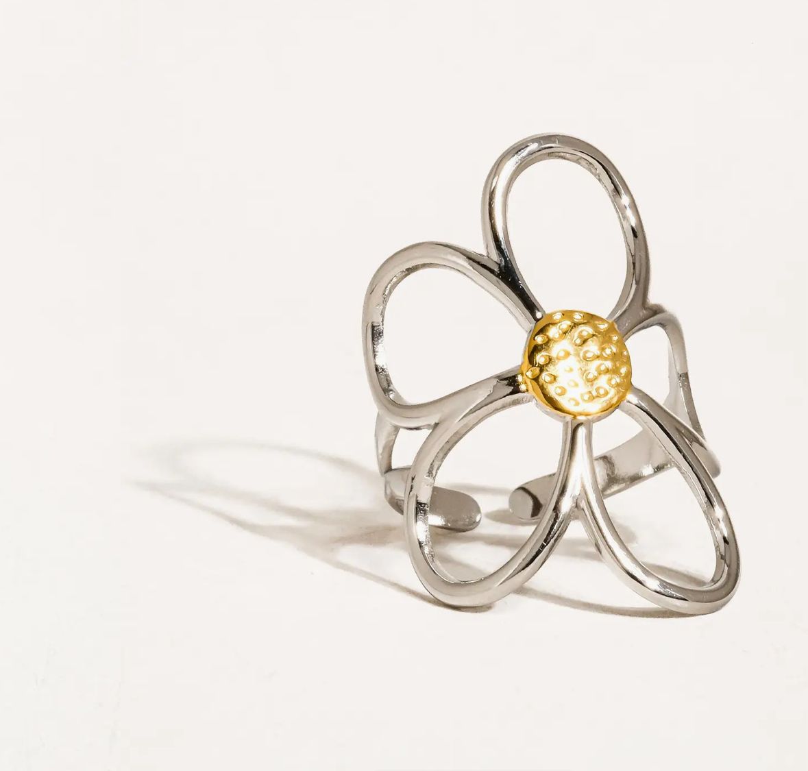 Anillo flor plateado  autoajustable