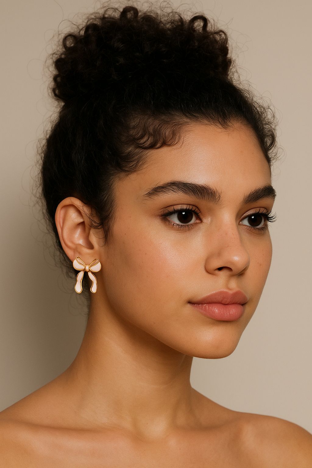 Aretes moño nacarado rosa suave